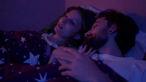 Couple in Bed Preparing for Sleep Night Stock Footage 145842248