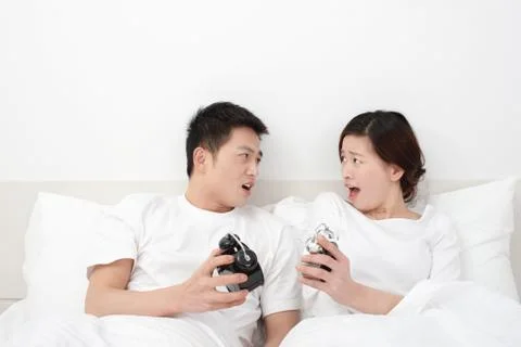A couple in the bedroom Stock Photos