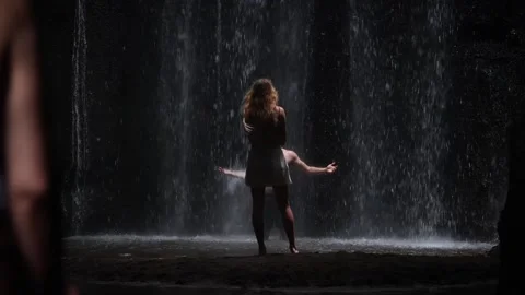 Couple below the waterfall Stock Footage 270039363