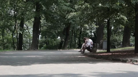 A couple on a bench Stock Footage 41320115