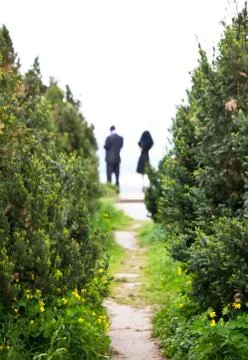 Couple between trees Foto stock