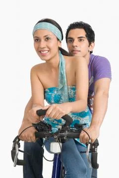 Couple on a bicycle Stock Photos
