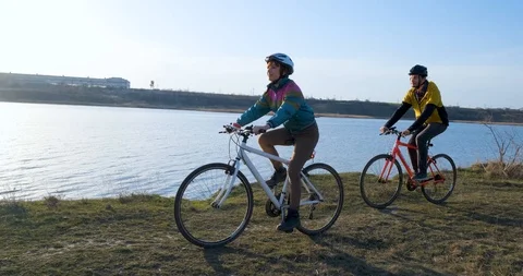 Couple bicycle riders Stock Footage 126349407