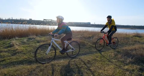 Couple bicycle riders Stock Footage 126349635