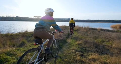 Couple bicycle riders Stock Footage 126349655