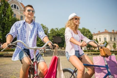 Couple with bicycles Stock Photos
