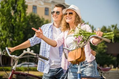 Couple with bicycles Stock Photos