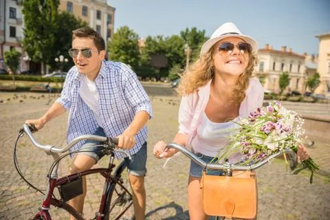 Couple with bicycles Stock Photos