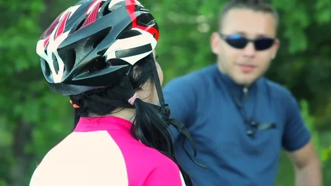 Couple of bikers talking Stock Footage 76594209