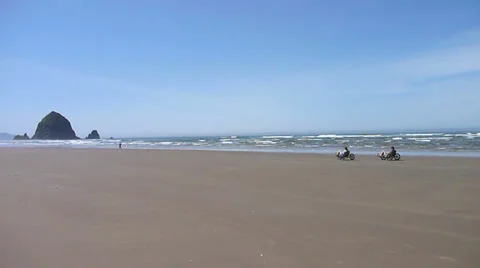 Couple Biking at Beach Stock Footage 22899538