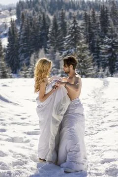 Couple in blankets in winter Stock Photos