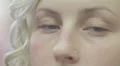 Couple of blue eyes of a young woman - macro HD Footage