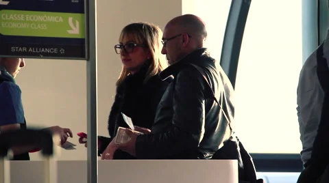 Couple at boarding gate Stock Footage 48960355