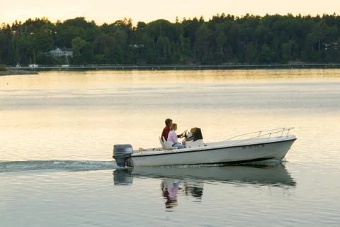 Couple Boating on Ocean Stock Photos