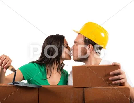 Couple builds a house Stock Photos