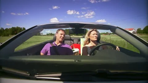 A couple in a cabriolet Stock Footage 11307992