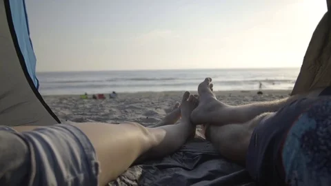 Couple Camping on the Beach Stock Footage 83055660