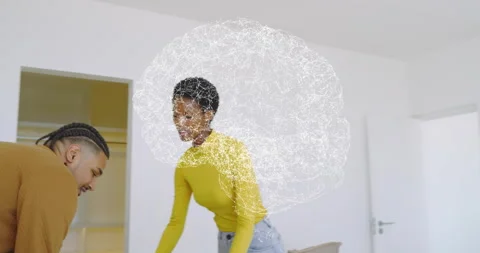 Couple carrying moving boxes into bedroom and unpacking clothes onto bed for Stock Footage 316183053
