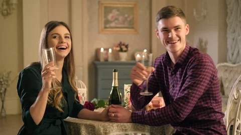 Couple celebrates in restaurant Video stock 83265853