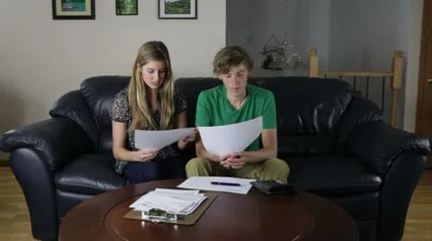 Couple Checking Monthly Bills Video stock 8923439
