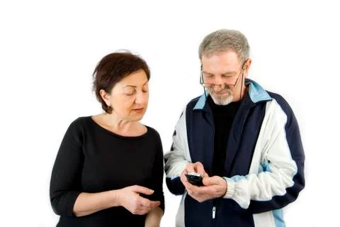 Couple checking the text message on the phone Stock Photos