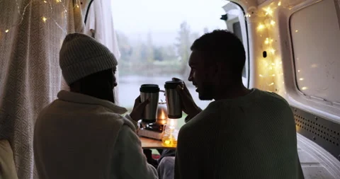 Couple, cheers and coffee while camping in caravan with love, romance and Vídeo Stock 254800949