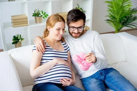 Couple choosing clothes Stock Photos