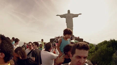 Couple at Christ the Redeemer Statue platform Stock Footage 64859187