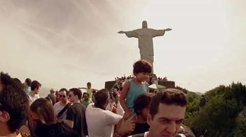 Couple at Christ the Redeemer Statue platform Stock Footage 64862513