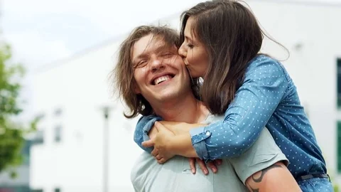 Couple city vacation fun. happy young people in love doing piggyback. Mixed race Stock Footage 78036053