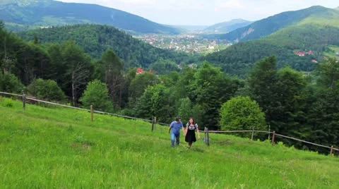 Couple Climb Mountain Stock Footage 11882413