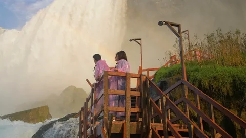 Couple Climb Stairs Path at Niagara Falls, Waterfall Rainbow Stock Footage 102444985