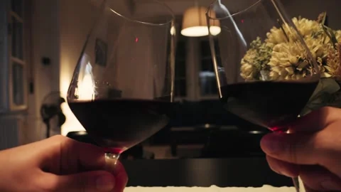 Couple clinking wine glasses during romantic dinner. Anniversary celebration Stock Footage 322169832