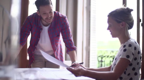 Couple collaborating on project Stock Footage 63294339