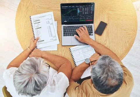 Couple, computer screen and data analysis, stock market graphs and budget 写真素材