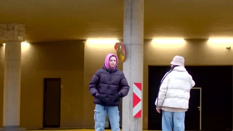 A couple connects in urban settings, emphasizing companionship Stock Footage 316499655