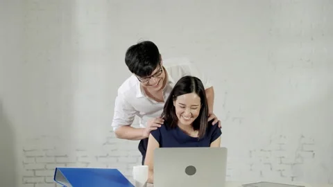 Couple in consultation , Help each other to think of using a notebook computer Stock Footage 151168937