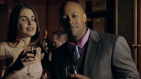 A couple conversing at a party - medium shot Stock Footage 42892408