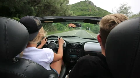Couple in convertible car Video stock 52528094