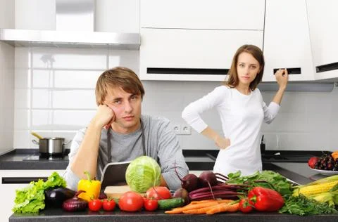 Couple cooking Stock Photos