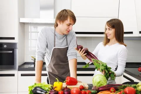 Couple cooking Stock Photos