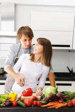 Couple cooking Stock Photos