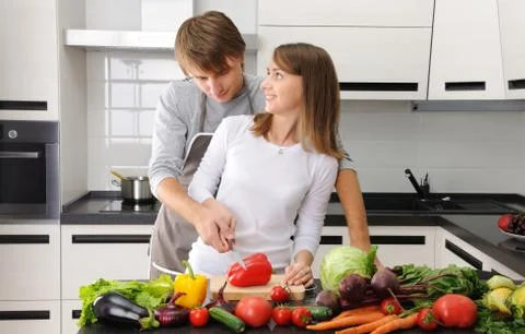 Couple cooking Stock Photos