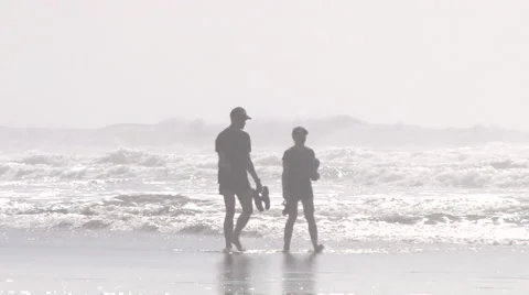 Couple Cooling Down On Humid Day At Beach Stock-Footage 61840539