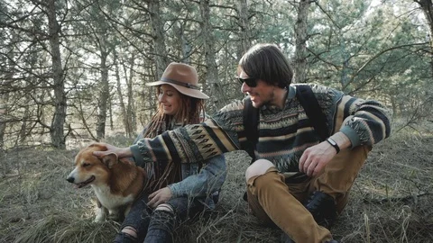 Couple with corgi dog Stock Footage 88837406