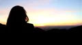 Couple cuddling during sunset HD Footage