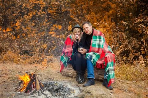 Couple with cups Stock Photos