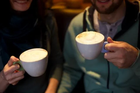 Couple with cups Stock Photos