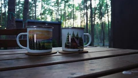 Couple with cups in the woods Stock Footage 197374981