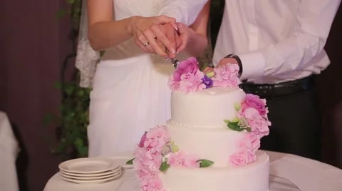 Couple cut the wedding cake Stock Footage 59802541